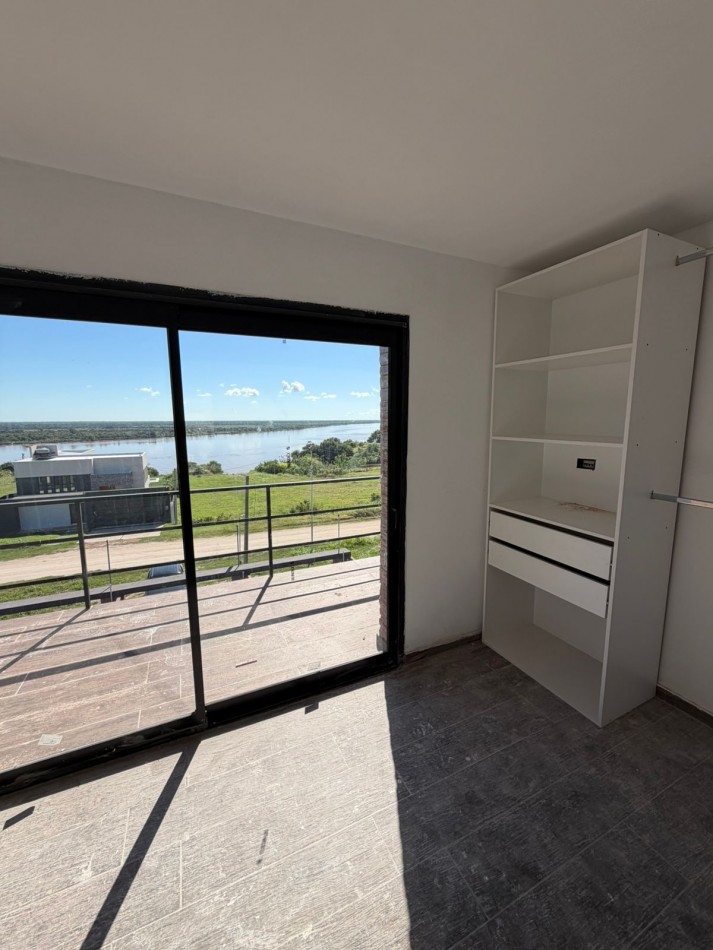 TRIPLEX A ESTRENAR CON VISTA AL RIO.